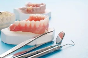 model of dentures dentist will use to answer the question what are dentures for patient