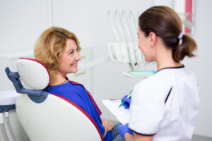A woman experiencing Granville dental treatment