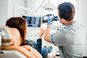 dental tech answering the question what is a prosthodontist for patient